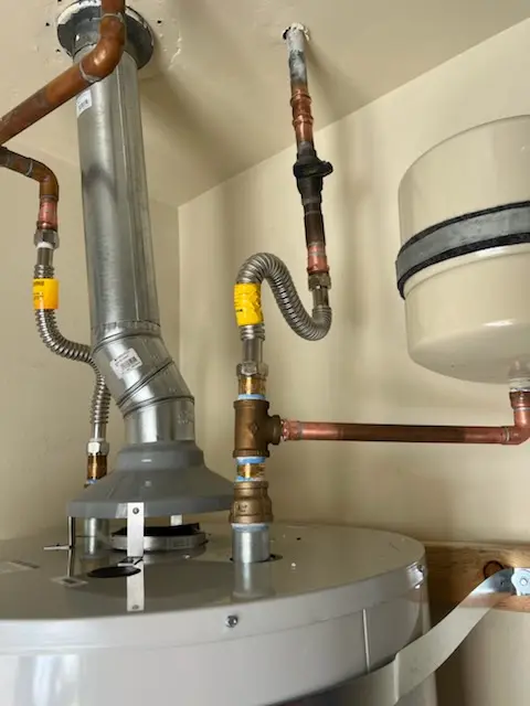 Water heater installation and plumbing repair in Elliot